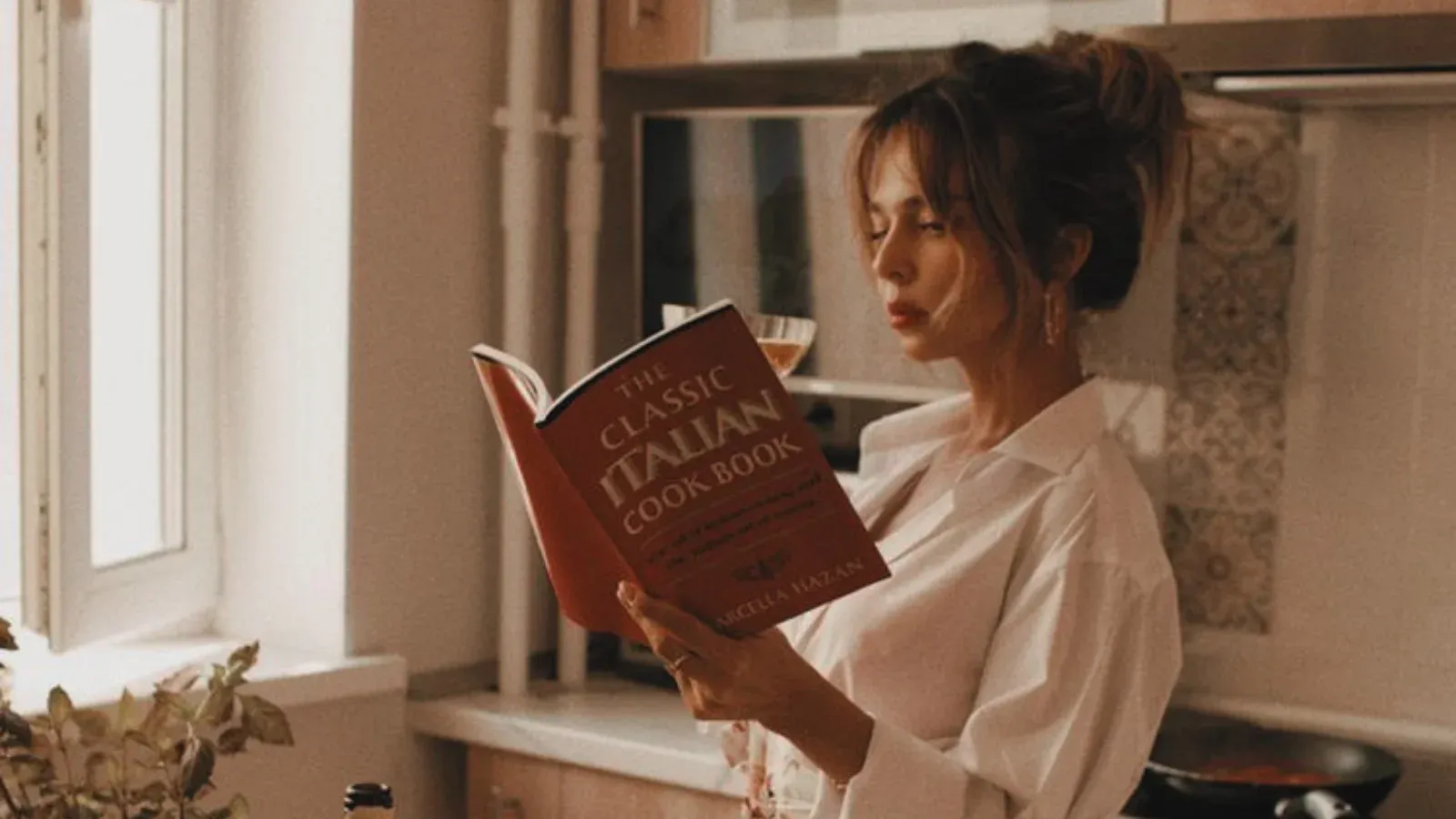 woman in her kitchen trying to think what to cook