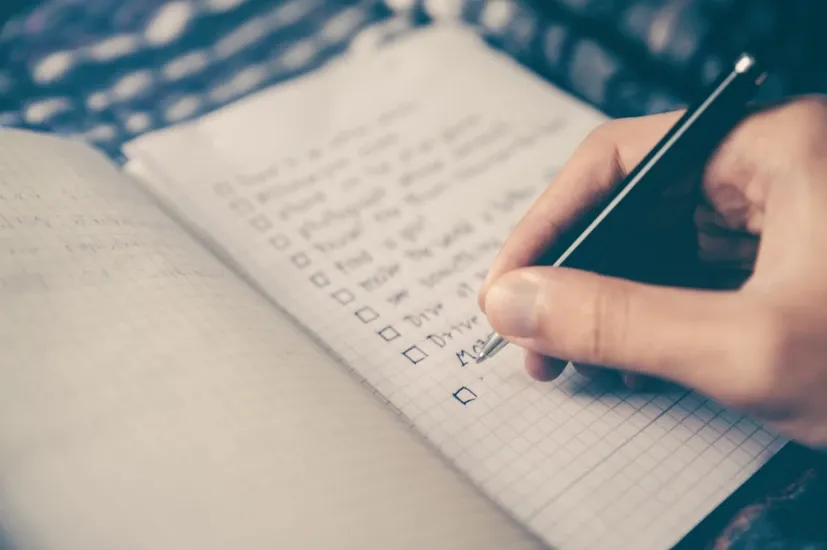 taking notes in a notebook