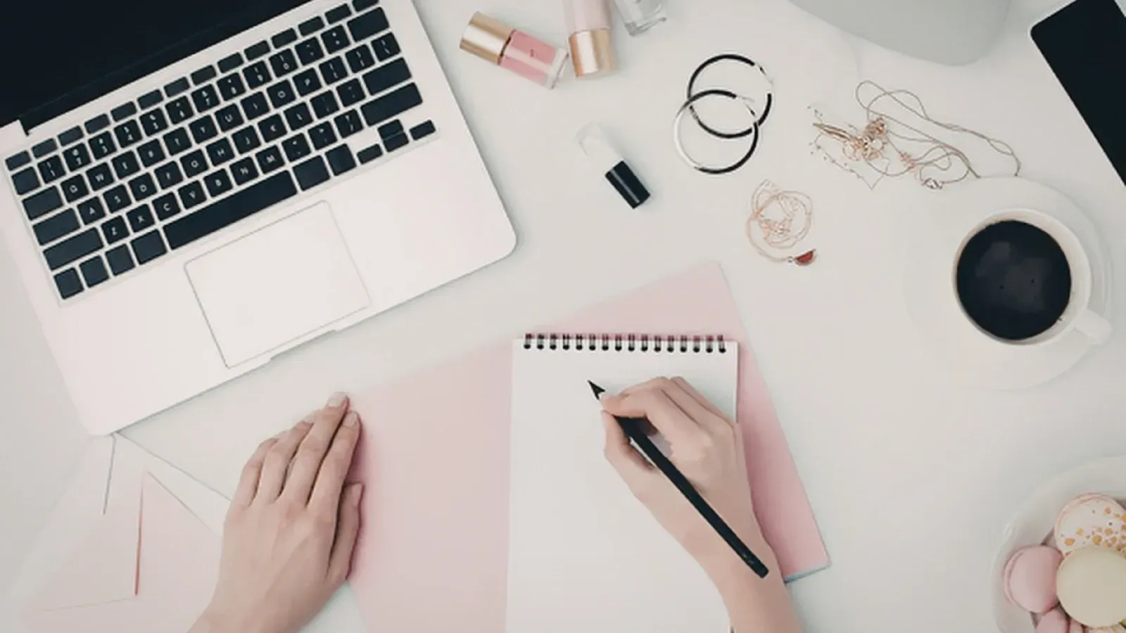 woman working on notebook to reinvent herself